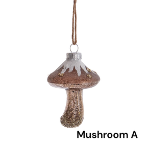 Decorative mushroom ornament with glittery texture on a white background
