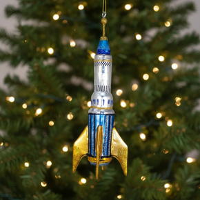 Decorative rocket-shaped ornament on a white background