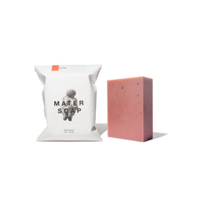 Mater Soap Rose Bar wrapping and unwrapped bar side by side against white background.