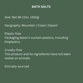 A dark green informational graphic with white text listing product details for bath salts, including size (net weight 12oz / 340g), geographic origin options (Mountain, Coast, or Desert), plastic-free packaging, cruelty-free status, and ethical sourcing.