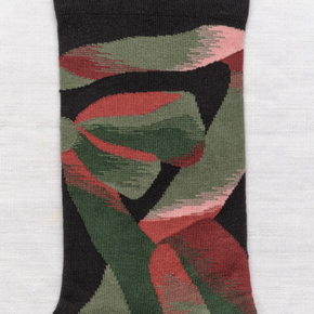 Close up of Bonne Maison Ribbon socks on white backdrop.