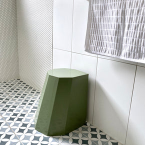 Arnold Circus Stool in Cotton Pale Eucalypt Green in tiled pale blue shower recess