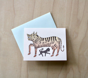 Tiger Letterpress Greeting Card with pale blue envelope on pale wood.