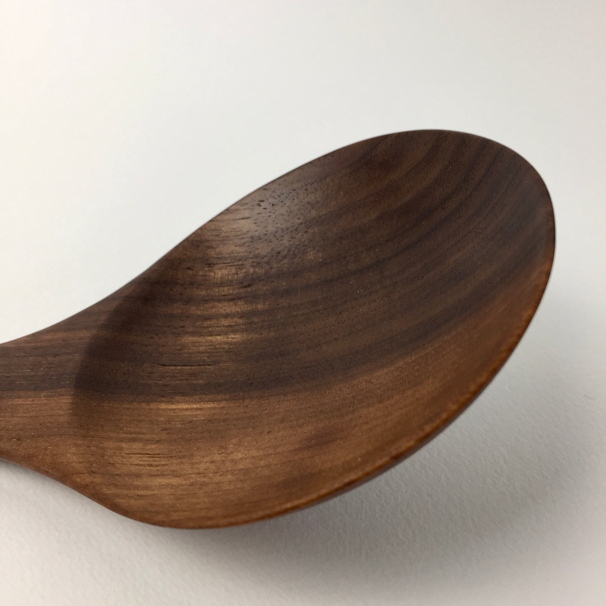 Close up view of Handmade Walnut Wood Soup Ladle with white background by Civil Dawn Studio
