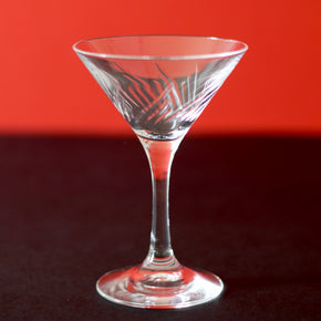 Japanese martini glass against red and black backdrop