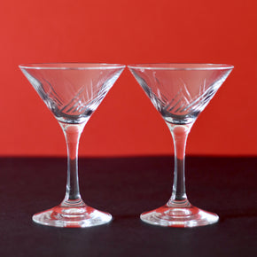 Japanese martini glasses x 2, against red and black backdrop