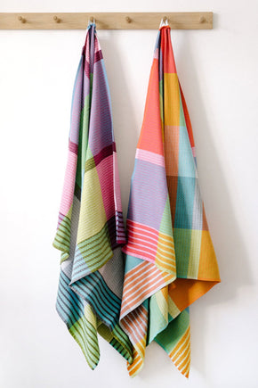 Mungo hanging Folly Beach Towel - Blue Crab and Fiddler Crab, in orange yellow, pink and blue