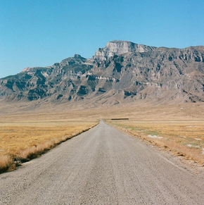 Large mountain range landscape and road