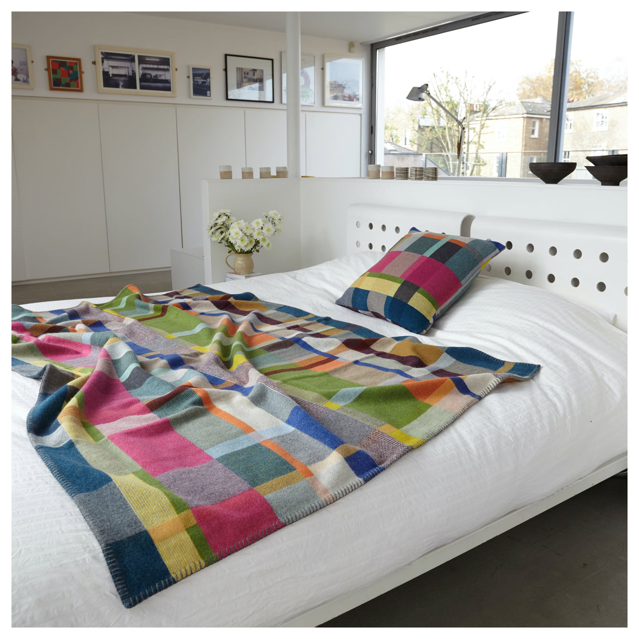 Premium Australian Merino Wool Throw Blanket in bright pink and blue on bed