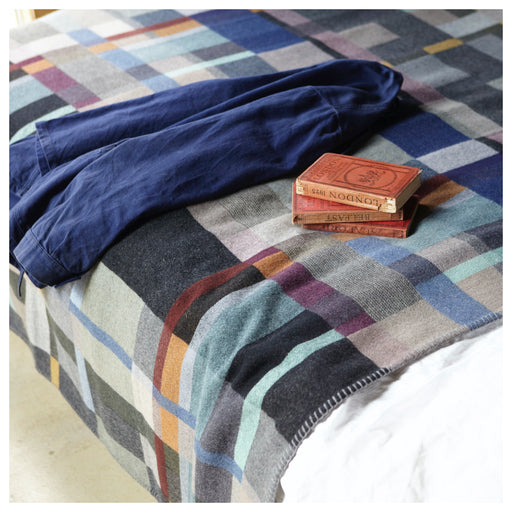 Large Wallace Sewell Erno Premium Australian Merino wool blanket on bed